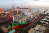The 400-meter-long, 23,000-TEU CMA CGM Jacques Saadé has been launched at Shanghai Jiangnan-Changxing Shipyard. It will be the world's largest containership to run on LNG fuel. (Photo: CMA CGM)