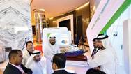 AbdulAziz Somali and Majed Saber from Saudi Aramco’s Marine Department brief visitors. Photo: Saudi Aramco