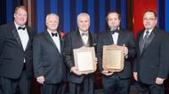 Accepting the AOTOS Mariners' Plaque on behalf of the officers and crew of the M/V Ocean Titan was Captain Christopher Hill (second from right). Accepting the Mariners' Plaque on behalf of the officers and crew of the USNS 1st LT Baldomero Lopez was AMO National Executive Vice President Robert Kiefer. With them at the AOTOS awards ceremony were (left to right) AMO National Assistant Vice President David Weathers, AMO National President Thomas Bethel and AMO National Secretary-Treasurer José Leon