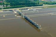 Aerial view of locks and dam on Mississippi River near Alton, Illinois, USA. Copyright Kent/AdobeStock
