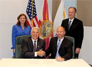 Paul Anderson, President & CEO of Port Tampa Bay (L), Capt. Tom Garrett, AMPE, IAMPE Advisory Board Member (R), Donna Wysong, AMPE, Vice President – Legal Affairs of Port Tampa Bay and IAMPE Advisory Board Member, and Mark Dubina, AMPE, Vice President – Security of Port Tampa Bay. Photo courtesy IAMP