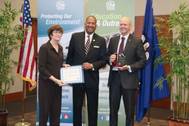 Andree Fant (left), Port NOLA Vice President of Planning & Facilities, and Robert Lloyd (right), Port NOLA Environmental Scientist, accepts an Environmental Leadership Award from Dr. Chuck Carr Brown (center), LDEQ Secretary. Photo credit LDEQ / Port NOLA