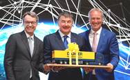 From left: Bernhard Simon, CEO Dachser, Albert Johnston, Managing Director, Johnston Logistics
and soon of Dachser Ireland as well as Michael Schilling, COO Road Logistics at Dachser, at transport logistic in Munich. (Photo: Dachser)