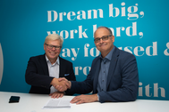 CADMATIC CEO Jukka Rantala (left) and Kymdata CEO Jyrki Metsola (right) shake hands on the acquisition agreement.
(Photo: Cadmatic)