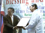 ClassNK Executive Vice President Koichi Fujiwara (left) presenting a certificate to PJMTM President Eduardo U. Manese.