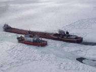 The crew of Coast Guard Cutter Mackinaw, homeported in Cheboygan, Mich., conducts an escort on Lake Superior near Whitefish Point April 3, 2014. (USCG photo)