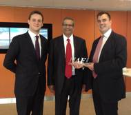 David Phillips (middle), Chairman of the NAFL and CEO of Freight Systems LLC presents Julien Horn (left) and Andrew Kemp (right) from TT Club with an award in recognition of their expertise.