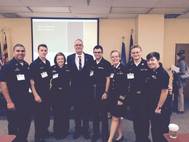 Doyle with Mass. Maritime Academy cadets (Photo: FMC)