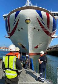 The SMS Group has had the busiest year in its 22-year history as the cruise and marine market re-opened. SMS engineers are pictured with a cruise ship. Photo courtesy the SMS Group