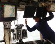 Installing survey monitors cutter Spar: Photo courtesy of NOAA