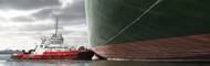 Kotup tugboat maneuvering a container ship. Image: Boluda Corporación Marítima
