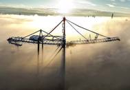 Liebherr STS crane rising above the fog. Photo courtesy Liebherr.