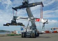 A Liebherr LRS 545 reachstacker assembling its six companions in Durban Port, South Africa. (Photo: Liebherr )