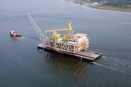 Tow of the loaded heavy lift barge Marty J from Houma, La.