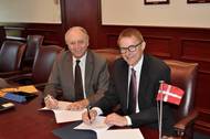 SUNY Maritime academic deal Gil Traub (left) and SIMAC vice president for academic affairs Jan Askholm sign the memorandum of agreement at SUNY Maritime College. The agreement paves the way for collaboration and partnership between the two institutions. (Photo: SUNY Maritime)