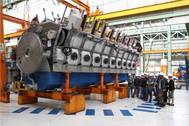 SUNY Maritime students get an up-close view of the assembly of an 18-cylinder Wärtsilä 50 diesel engine during their visit to Trieste, Italy. Photo Wartsila