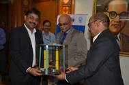 Neeraj Bansal, Chairman in-charge JNPT (left) receiving the Radiation Detection equipment from P. Sudhakar, CMD, ECIL (right) in the presence of Dr. R.K.Sinha Chairman, AEC and Secretary, DAE)