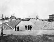 Dry Dock 1 at Newport News Shipbuilding is flooded prior to the official opening celebration of the shipyard's first dry dock on April 24, 1889. The Puritan-class monitor USS Puritan waits beyond the dry dock’s gate to enter. (Photo: HII)