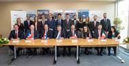 Nikolay Kolesnikov, Senior Executive Vice-President and CFO of Sovcomflot (sitting in the centre) together with the signees from KfW IPEX-Bank, Credit Agricole, ING Bank, Societe Generale, Citibank, UniCredit, and DVB Bank (sitting, from left to right). Photo: Sovcomflot