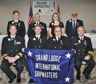 2017 officers of the International Ship Masters’ Association: (front row, L to R) Grand Secretary-Treasurer Brian Eickel, Grand President Lee Barnhill, Grand 1st Vice President Harold Dusseau, Grand 2nd Vice President Mark Mather; (back row L to R) Grand Chaplain Mary Ann Schallip, Grand Sentinel Scott Reynolds, Grand Warden Caitlin Clyne, Grand Marshal Greg Stamatelakys. (Photo: Paul Jagenow)