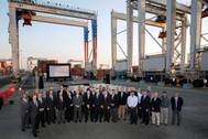 Officials from Konecranes and the Georgia Ports Authority commemorated the 1,000th rubber-tired gantry crane produced by the company, and completion of the latest phase of GPA's electric RTG infrastructure. The eRTGs use 95 percent less diesel than standard RTGs, saving on fuel costs and emissions. (Photo: GPA)
