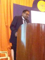 Capt Philip Mathews, Master of CMMI delivering his address