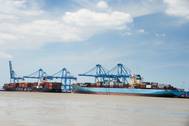 Photo Credit/Port NOLA: Container vessel being worked by current gantry cranes at Napoleon Avenue Container Terminal site.