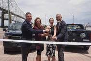 Photo Credit/Port NOLA: From left to right: Director of Marketing for XL Fleet Eric Foellmer, Port NOLA President & CEO Brandy D. Christian, Executive Director of Regional Planning Commission Jeffrey Roesel and Director of Southeast Louisiana Clean Fuel Partnership Courtney Young cut the ribbon on two new plug-in hybrid trucks.
