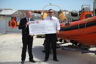 Eric Plance presents donation to RNLI (Credit Fendercare)
