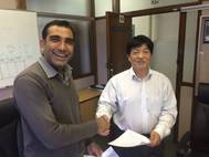 Prasheen Maharaj (left), CEO of Southern Africa Shipyards, seals the deal with Ye Fengsheng of China Shipbuilding Trading Company. (Photo courtesy of SAS)