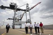 President Barack Obama tours the Jacksonville Port Authority, accompanied by (from left) Transportation Secretary Anthony Foxx; Dennis Kelly, TraPac Regional VP & General Manager; Roy Schleicher, CEO, Jacksonville Port Authority; and Fred Wakefield, International Longshoreman's Association representative. (Official White House Photo by Amanda Lucidon)