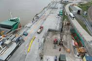 Radar tower construction site with Arklow Falcon along side discharging cement materials at Tarmac’s Northfleet facility (Photo: PLA)