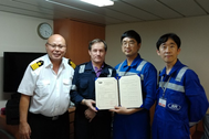 left to right, Capt. Kyaw Myint (SONGA HAWK master), Mijo Banicek (Songa Ship management electrical superintendent), Jeoung-kyu Lim and Sang-hoon Choi from KR’s Cyber Certification Team. (Photo: KR)