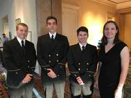 From left: Scholarship recipients Samuel Comerford, Alex Yonkman and Tyler Sayvetz with Crowley's Victoria Ellis. Not shown: Kent Treptow (Photo: Crowley)