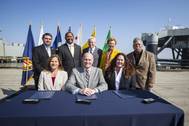 (Seated, from left) Kim Ostrowski, Director of the Navy Base Realignment and Closure Program Management Office West; Maritime Administrator Paul “Chip” Jaenichen; Harbor Commissioner Tracy Egoscue; (standing, from left) Richard Cameron, Port Managing Director of Environmental Affairs and Planning; Long Beach Vice Mayor Rex Richardson; Port CEO Jon Slangerup; former Long Beach Mayor Beverly O'Neill; and Long Beach Councilmember Roberto Uranga, District 7.)