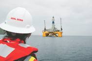 A Shell staff in a Goal Zero hardhat looking at the Polar Pioneer drilling unit in Dutch Harbor, Alaska, July 2015. (Photo: Shell; Photographer: Judy Patrick)