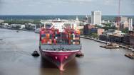 ONE Stork Port of Savannah: The Ocean Network Express vessel Stork sails up river past historic downtown Savannah on its maiden voyage to the Port of Savannah. (Photo: Georgia Ports Authority/Stephen B. Morton)