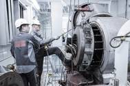 ABB Turbocharging service engineers at work carrying out maintenance on a containership (Photo: ABB)