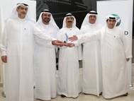 DP World’s Chairman HE Sultan Ahmed Bin Sulayem, Vice Chairman HE Jamal Majid Bin Thaniah, Group CEO Mohammed Sharaf; Senior Vice President and Managing Director of UAE Region, Mohammed Al Muallem, and COO Mohammed Ali Ahmed holding the Award.