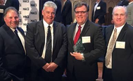 Buck Younger, third from left, was named the Marine Engineer/Naval Architect of the Year. Attending the awards presentation were VT Halter Marine’s Alvin Erkhart, Vice President of Production, Kevin Amis, Executive Vice President of Operations, and Rob Mullins, Deputy President. (Photo: VT Halter)