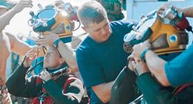Commander Bobbie Scholley and Captain Chris Murray in Mk 21 with DUI hot water suits in preparations to dive to 240 fsw during MONITOR Expedition 2001. Photo courtesy of US Navy/Released.