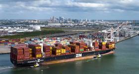 With downtown Tampa as its backdrop, the ZIM Canada arrives carrying 11,900 twenty-foot equivalent units (TEUs) — the highest capacity ever handled at Port Tampa Bay. © Port Tampa Bay