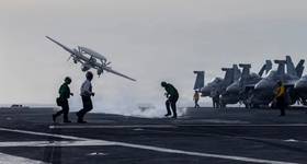 An E-2D Hawkeye, attached to Airborne Command & Control Squadron (VAW) 117, launches from the flight deck of Nimitz-class aircraft carrier USS Abraham Lincoln (CVN 72) during Operation Epic Fury, March 31, 2026. (U.S. Navy photo)
