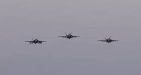 Three F/A-18E Super Hornets, attached to Strike Fighter Squadron (VFA) 14, fly over Nimitz-class aircraft carrier USS Abraham Lincoln (CVN 72) during Operation Epic Fury, April 2, 2026. (U.S. Navy photo)
