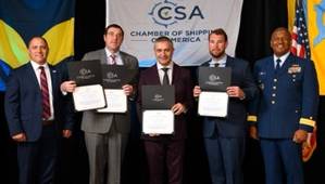 Garrett Huffman, Chairman, Chamber of Shipping of America; Captain Nick St. Jean, Crowley; Chief Engineer Dimiter Mitev, Crowley; Captain Kevin Wood, Crowley; Rear Admiral Will E. Watson, Heartland District, U.S. Coast Guard. Credit: Crowley