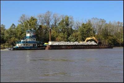 Barge on the Missouri River delivers rock to stabilization areas along the river. (Photo: U.S. Army Corps of Engineers, Kansas City District)