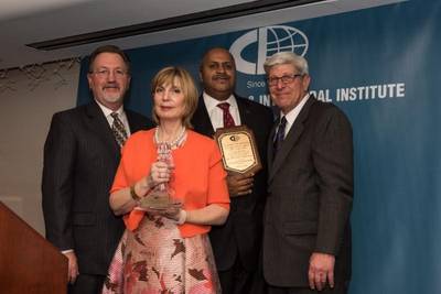 Back row: Captain Richard Schoenlank, President, New Jersey Sandy Hook Pilots Association, and Captain John DeCruz, President, New York Sandy Hook Pilots Association, accepting the Lifetime Achievement Award on behalf of the Sandy Hook Pilots Association. Front row: Connie Award recipient, Carol N. Lambos of The Lambos Firm with CII President, Michael DiVirgilio (Photo: CII)