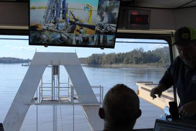 In the control tower of the Dredge Goetz, Maj. John Chambers views the data screen showing the different features of the dredging controls November 3, 2021. Ship masters from the Goetz instructed him on the basic operations of the dredging crane and agitator. (Photo: James F. Lowe / USACE)