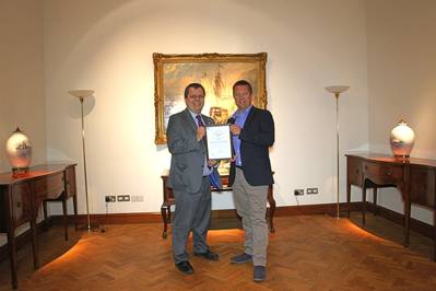 Nick Davis, CEO of GoAGT, receiving ISO/PAS 28007 certificate from David Derrick, LRQA’s UK Business Centre Manager.