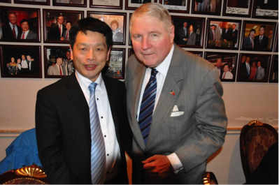 Wang Jianmin, Vice President of the Shanghai Shipping Exchange and Commissioner Richard A. Lidinsky, Jr.
